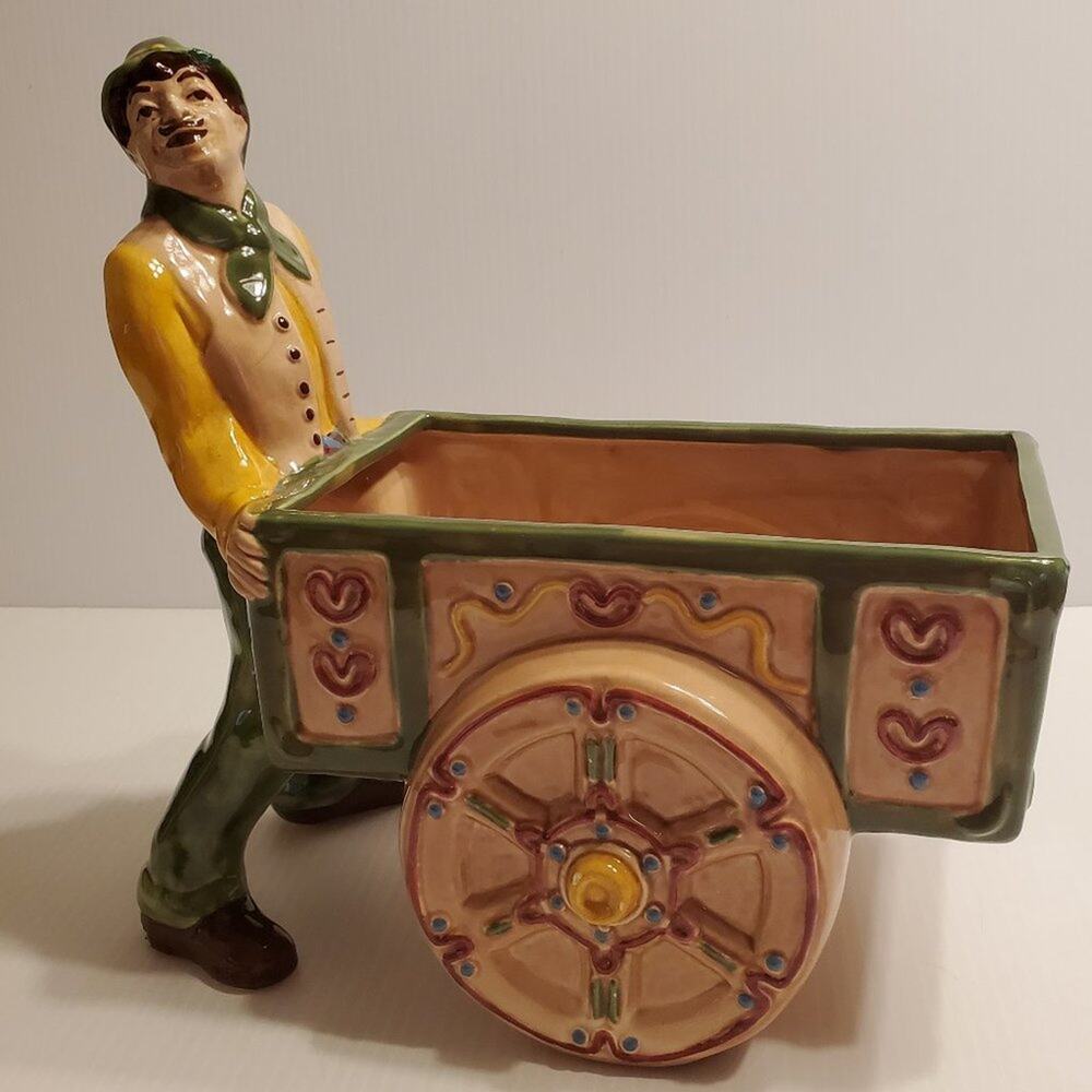 Brayton Laguna man with flower cart planter figure